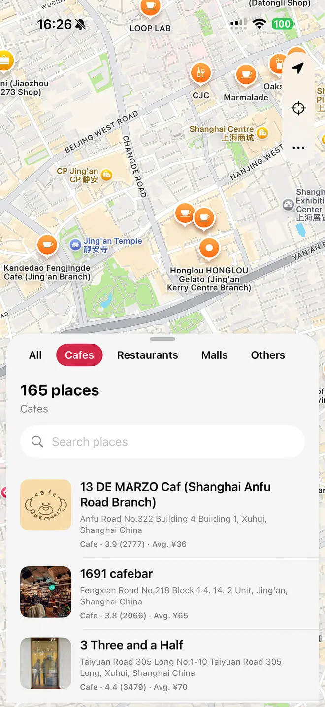 China Like a Local app showing a Shanghai map and an English list of cafés